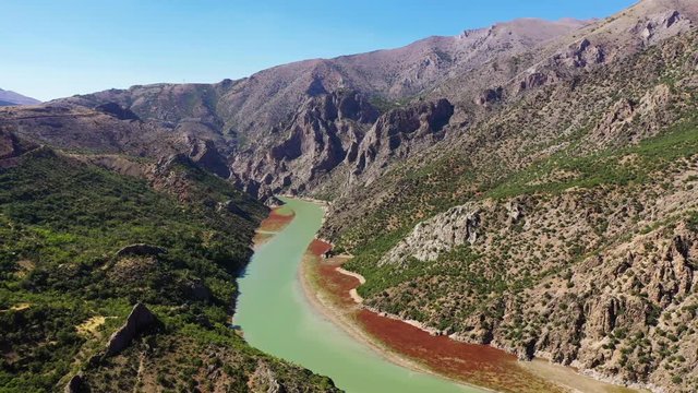 Karanlık Canyon, literally "Dark Canyon", is a deep steep-sided gorge located between the İli&ccedil; and Kemaliye districts of Erzincan Province, Turkey, formed by Karasu River on the Munzur Mountains.