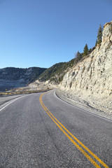 Scenic road, color toned picture, travel concept, Colorado National Monument Park, Colorado, USA.