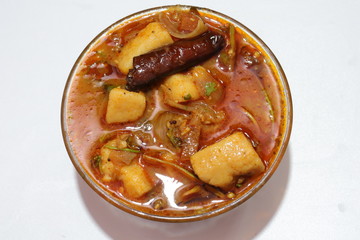 spicy tasty south india traditional homemade elephant foot yam gravy recipe cooked ready to serve

