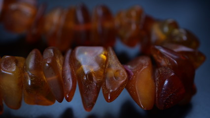 Baltic amber bracelet lies on the table