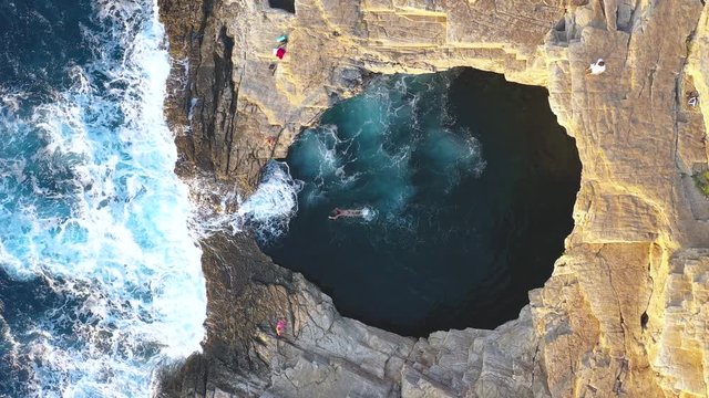   Above aerial view of Giola lagoon, natural pool near the sea, in Thassos island, Greece
