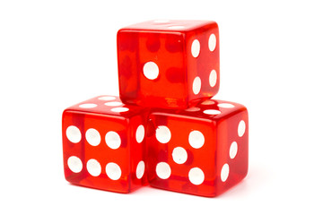 Transparent and red glass dices isolated on white background.