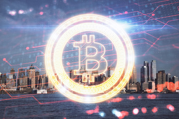 Double exposure of crypto currency theme hologram drawing and city veiw background. Concept of...