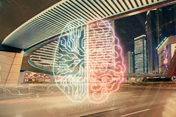 Brain hologram drawing on city scape background Double exposure. Brainstorming concept.