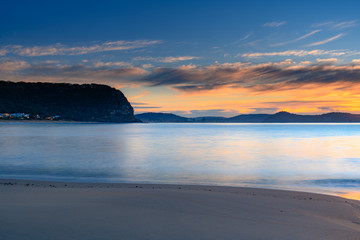 Fototapeta na wymiar Gentle Sunrise at the Seaside