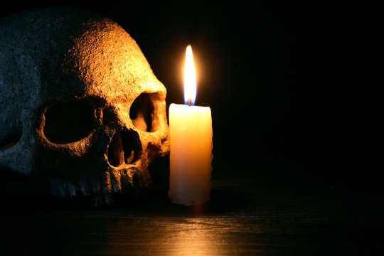 Candle Near Skull
