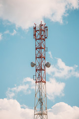 Telecommunications Cell Phone Tower With Antenna On Sunny Sky
