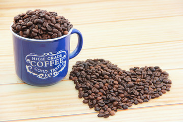 natural black coffee beans in the form of a heart