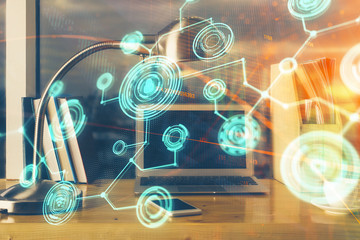 Computer on desktop with social network theme icon. Multi exposure. Concept of international connections.