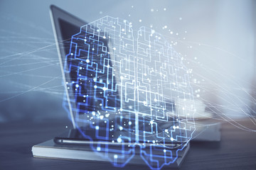 Multi exposure of work table with computer and brain hologram. Brainstorm concept.