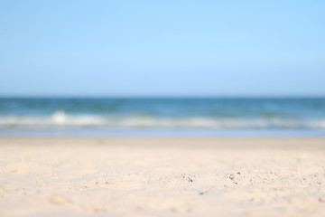 Fototapeta na wymiar A photo of blurry calm tropical beach in sunny windy warm day