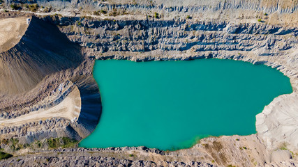 Aerial  view of the crushed stone mine. Open pit for the production of crushed stone, sand and gravel for use in the construction industry.
