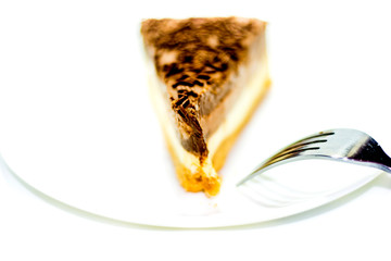 Portion of delicious chocolate cake on white background