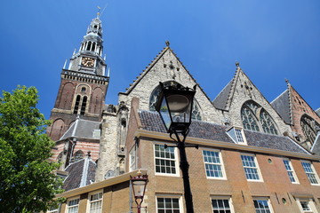Oude kerk church, located along Oudezijds Voorburgwal canal in Amsterdam, Netherlands