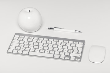 Clavier, souris d'ordinateur sans fil et stylo sur fond blanc © P.E Faivre