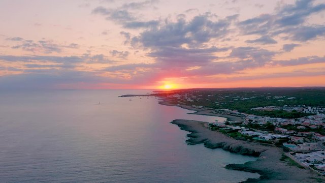 Breathtaking Sunset View By The Calm Sea In Son Ganxo, Menorca - aerial