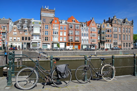 Kadijksplein, with crooked heritage buildings and bicycles in the foreground, located in Amsterdam Centrum, Amsterdam, Netherlands © Christophe Cappelli