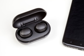 Wireless headphones on a white background. Wireless headset closeup isolated on white background.