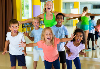 Happy children in dance studio smiling and having fun. High quality photo