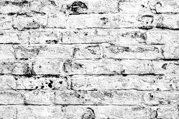 Obraz premium Texture of a brick wall with cracks and scratches