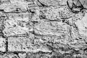 Texture of a concrete wall with cracks and scratches