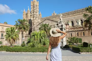 Foto op Plexiglas Beautiful girl visiting Palermo Cathedral in Sicily. Summer holidays in Italy. © zigres