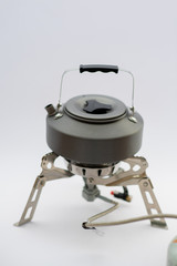 portable gas stove for cooking. Hiking, camping equipment. bushcraft and survival concept