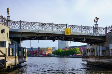 Cityscape with view of the river Pregolya, bridge and modern buildings.
