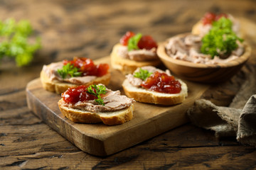 Fototapeta na wymiar Traditional homemade pate on toast with jam