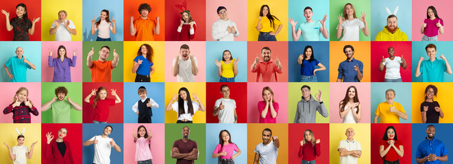 Obraz na płótnie Canvas Collage of portraits of 38 young emotional people on multicolored background. Concept of human emotions, facial expression, sales. Smiling, heart gesture, thumb up, happy, celebrating, pointing