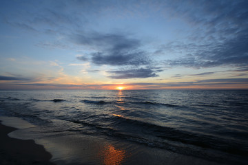 Fototapeta na wymiar Picturesque sunset on the Polish coast of the Baltic Sea