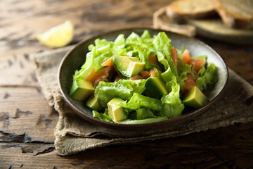Healthy avocado salad with smoked salmon