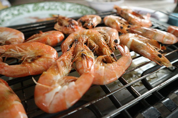 Grilled shrimps on the stove, seafood.