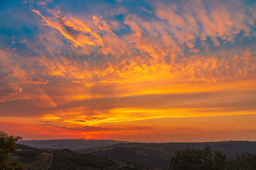Sunset over the Tuscany hills. Travel destination Tuscany