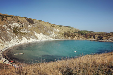 A calm  Lulworth Cove on the Jurassic Coast, Dorset, UK