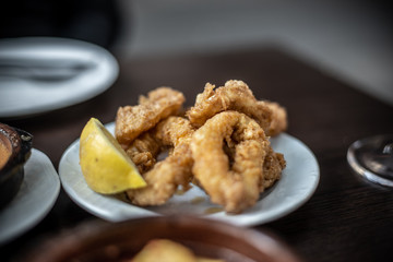 portion of fried squid on the restaurant table 