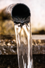 Fototapeta na wymiar water flowing from a fountain
