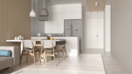 Blur background interior design, modern living room with sofa, dining table with chairs, kitchen with island, appliances and pendant lamps. Marble floor,