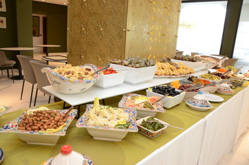 Moroccan buffet, traditional Moroccan food, tagine, chebakia, and Arabic sweets