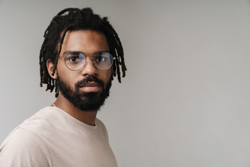 Serious african guy in eyeglasses