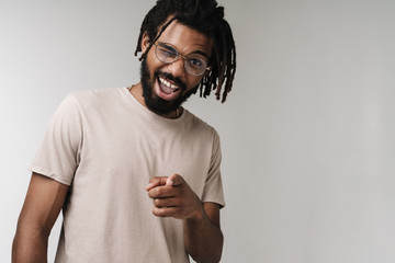 African guy pointing to you and winking