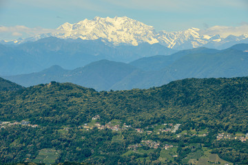 Obraz premium Malcantone valley with the Alps and Mount Rosa at the bottom