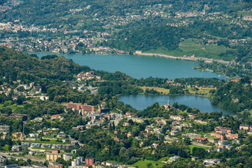 Fototapeta na wymiar Aerial view of lake Muzzano and Lugano in Switzerland