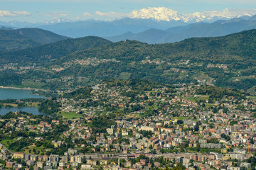 Fototapeta na wymiar Aerial view of the center at Lugano with the Alps and Mount Rosa at the bottom