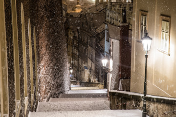 Old town streets at night in snow