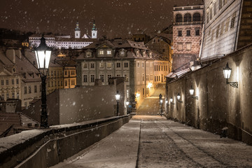 Fototapeta na wymiar Old town streets at night in snow