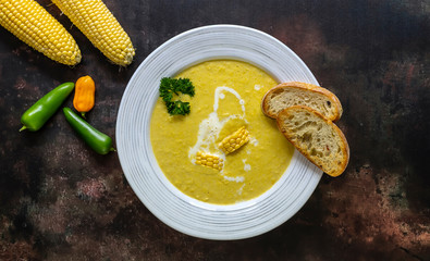 Traditional autumn spicy corn soup. Vegetarian cuisine.