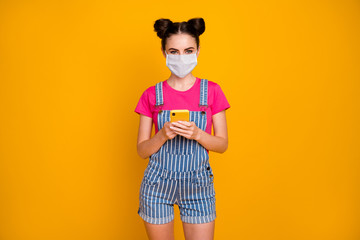 Portrait of her she nice attractive lovely girl using device wi-fi wearing safety mask stay home...