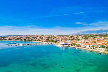 Croatia, beautiful Adriatic coastline, town of Novalja on the island of Pag, city center and marina aerial view from drone
