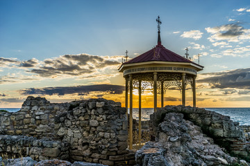 Beautiful landscape with sunset and Royal gazebo